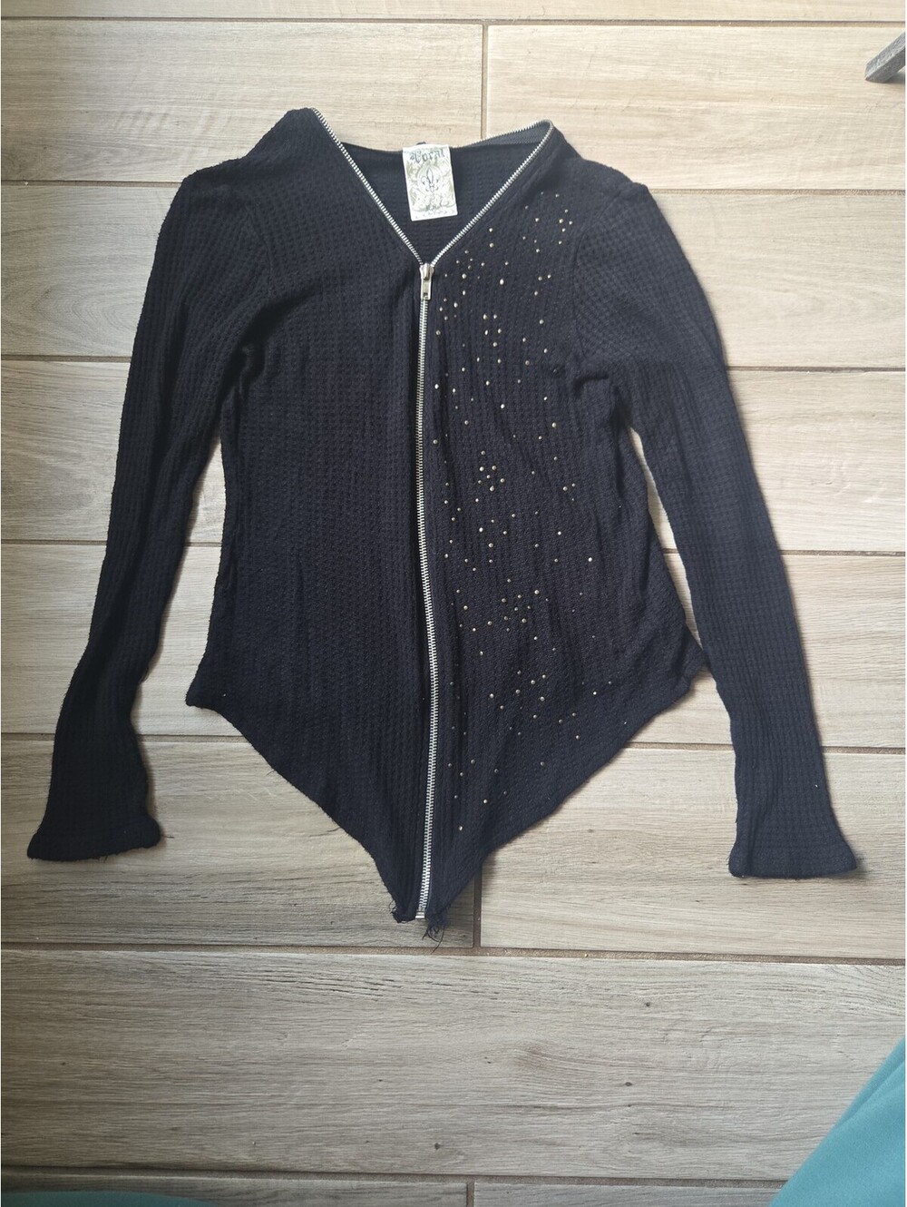 Women's black long sleeve zip-up knit top with embellishments